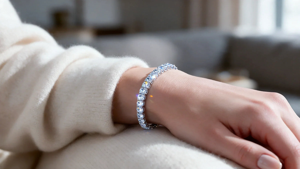 Round lab grown diamond tennis bracelet in white gold on a woman's wrist (AI-generated editorial image)