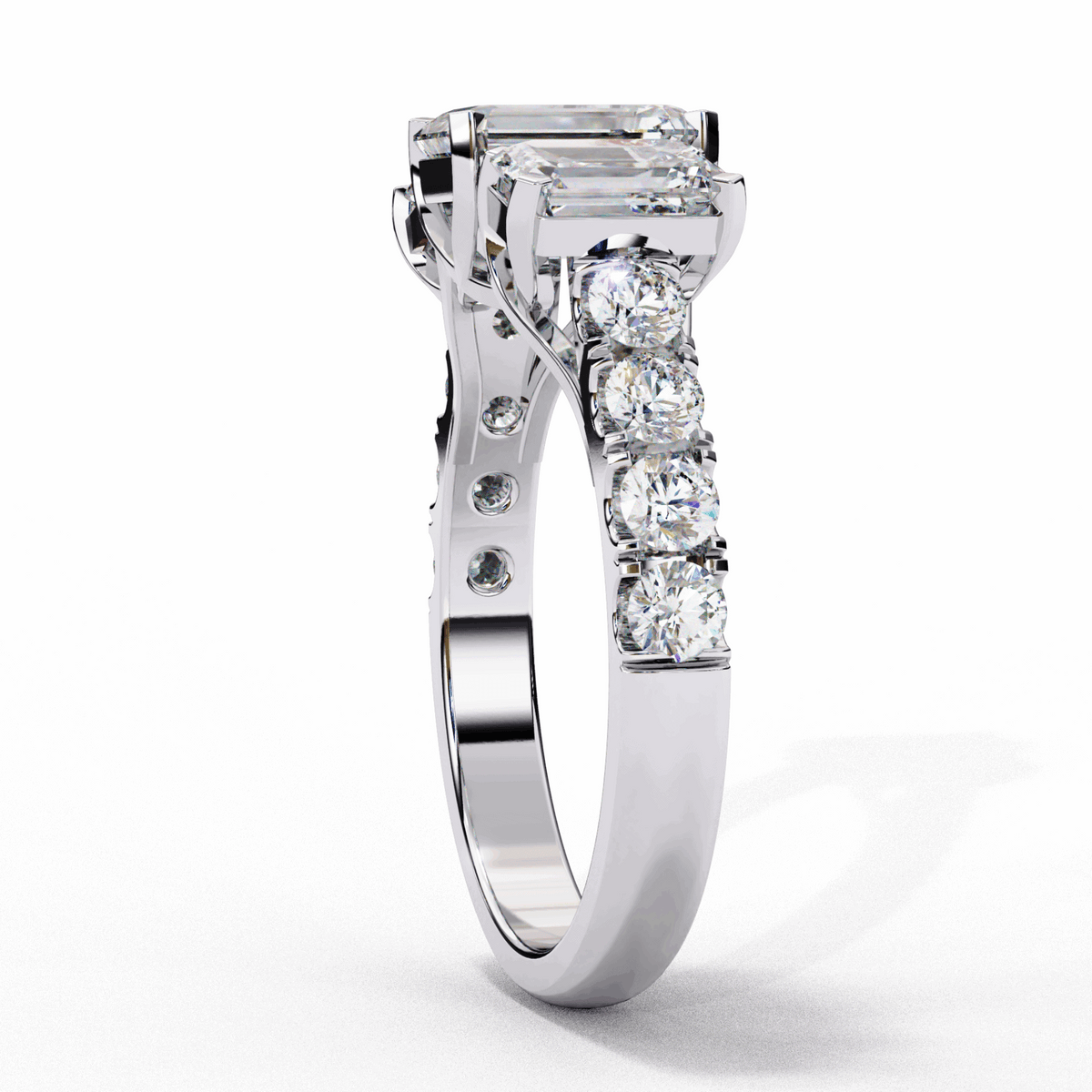 3 Carat Emerald Three Stone Solitaire Ring in Moissanite | House of Estara
