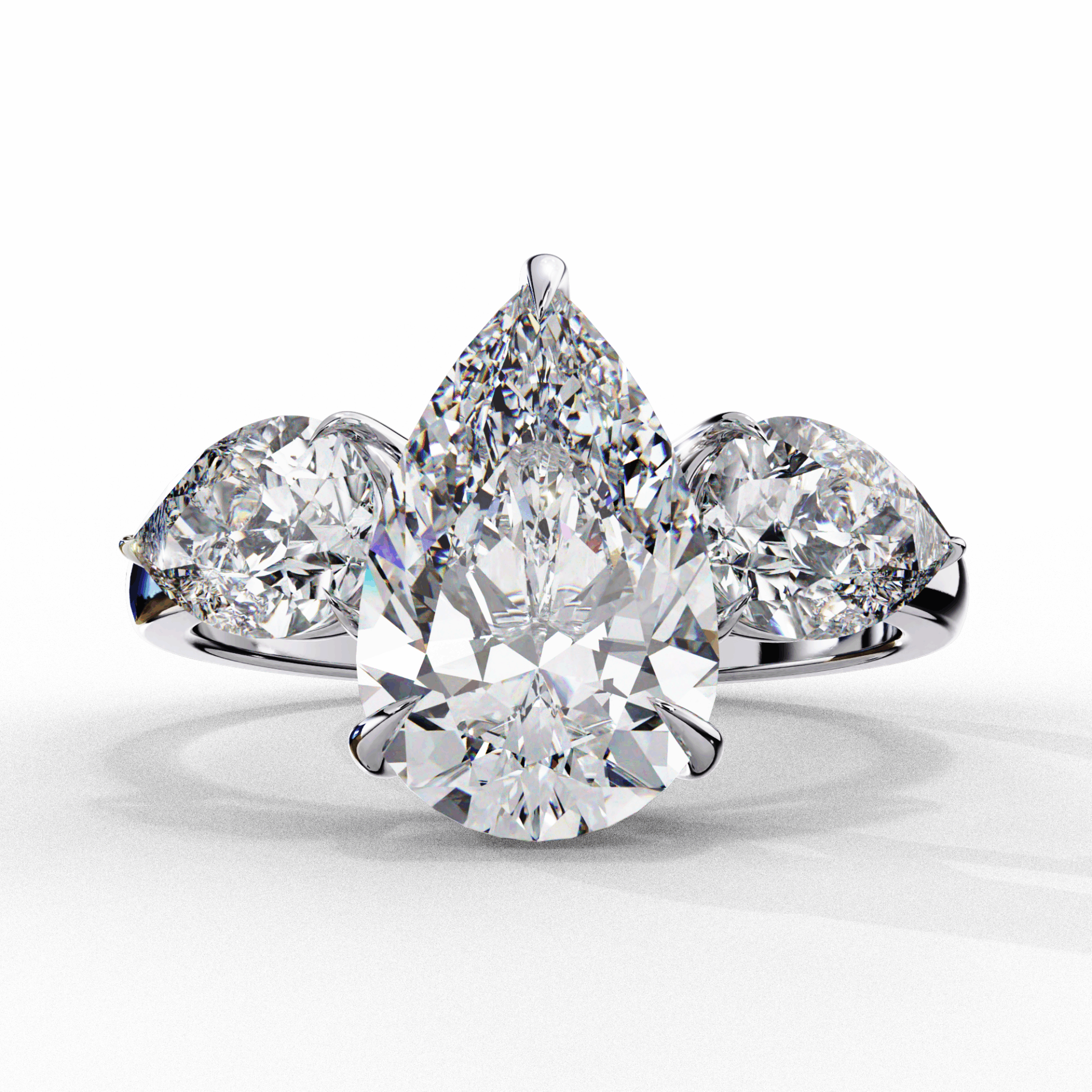 3 Carat Pear Three Stone Solitaire Ring in Moissanite | House of Estara