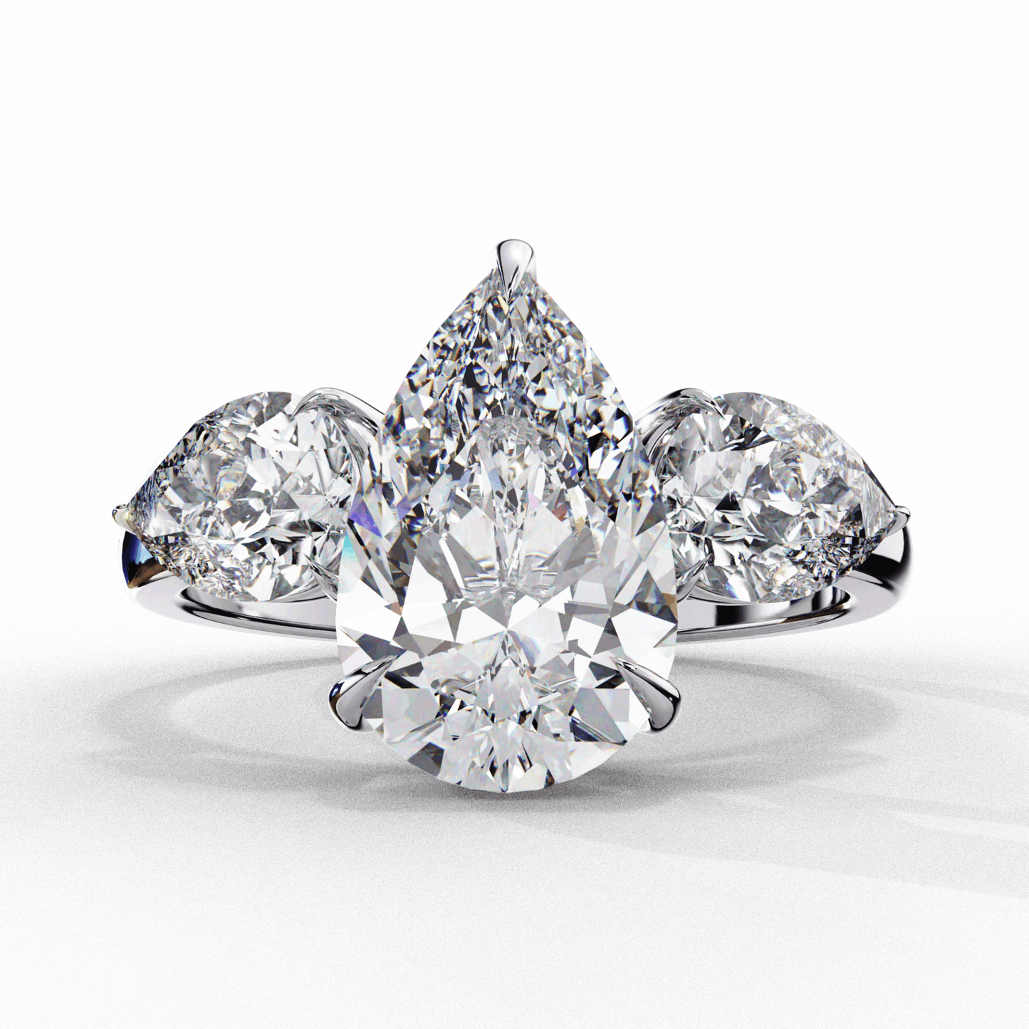 3 Carat Pear Three Stone Solitaire Ring in Moissanite | House of Estara