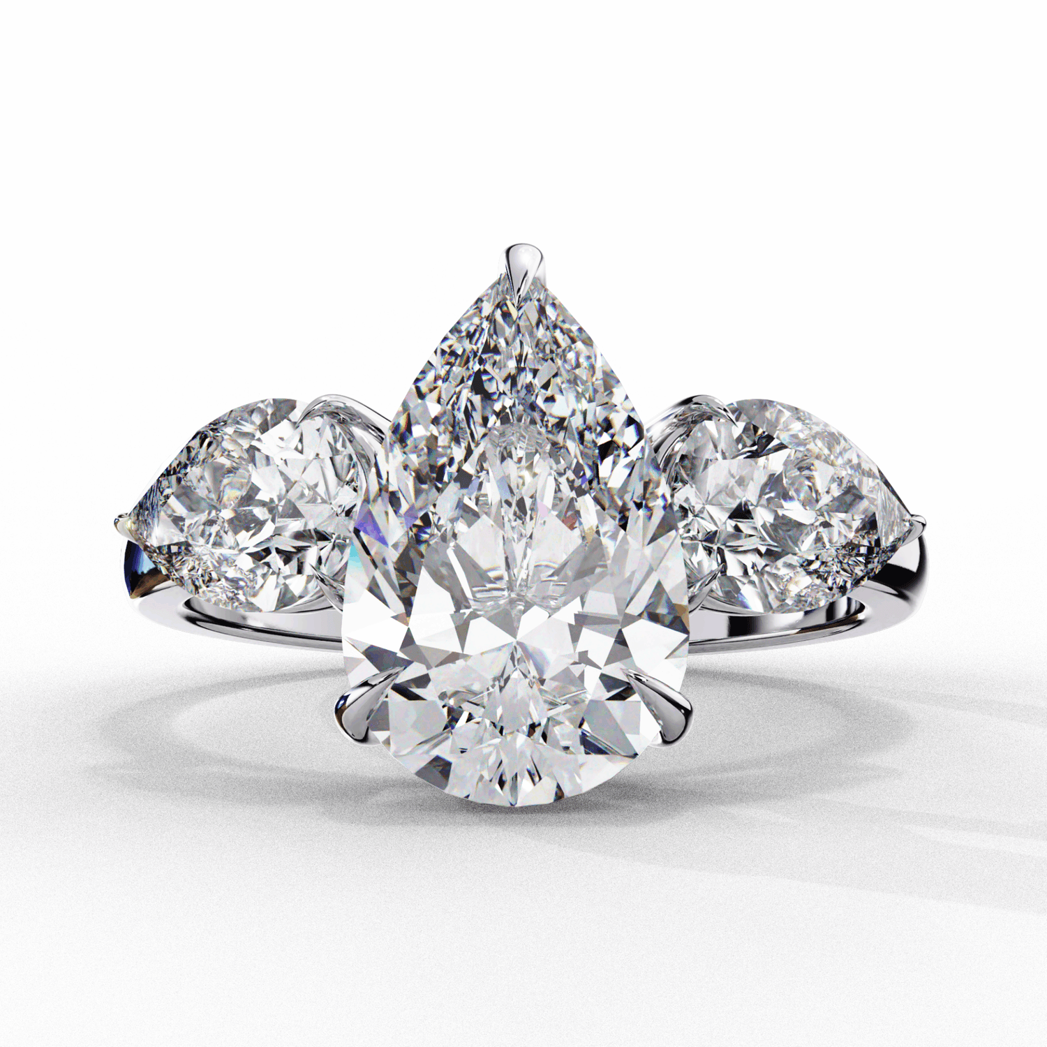 3 Carat Pear Three Stone Solitaire Ring in Moissanite | House of Estara