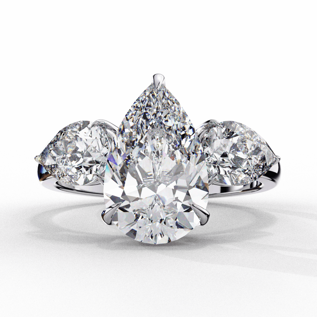 3 Carat Pear Three Stone Solitaire Ring in Moissanite | House of Estara