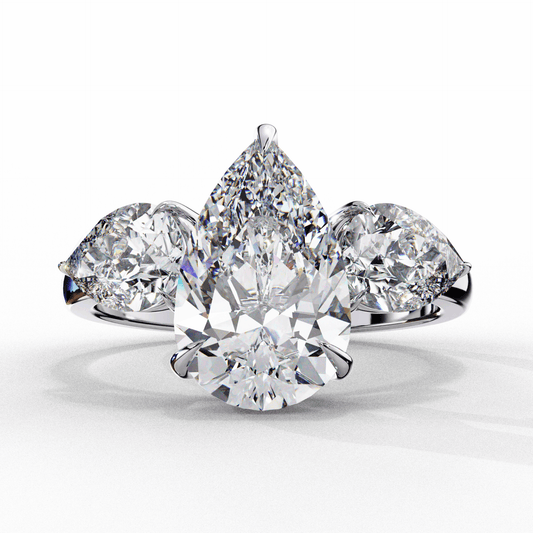 3 Carat Pear Three Stone Solitaire Ring in Moissanite | House of Estara