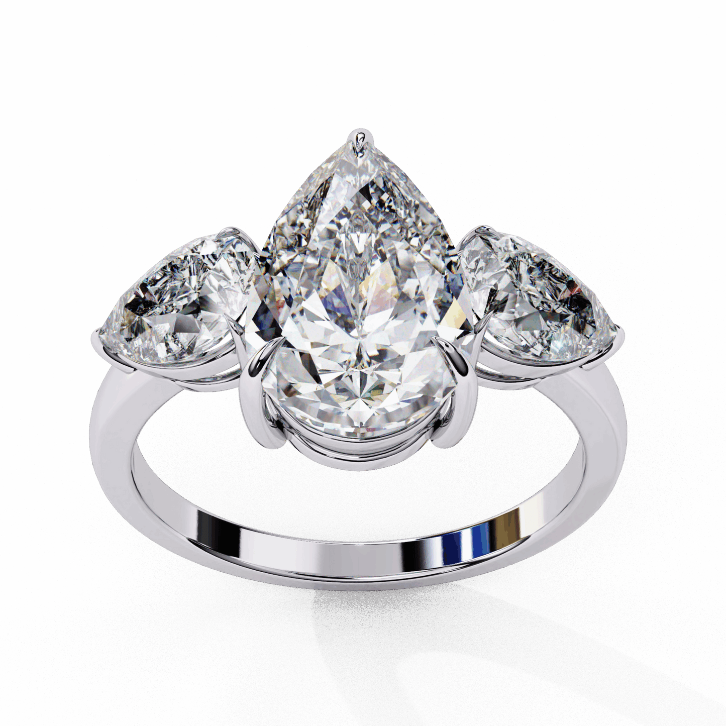 3 Carat Pear Three Stone Solitaire Ring in Moissanite | House of Estara