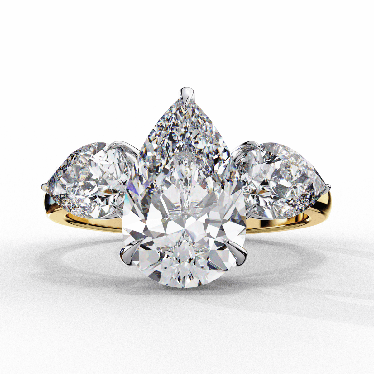 3 Carat Pear Three Stone Solitaire Ring in Moissanite | House of Estara