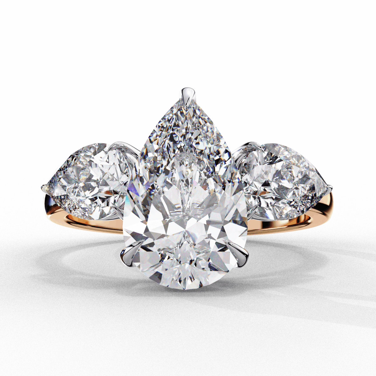 3 Carat Pear Three Stone Solitaire Ring in Moissanite | House of Estara