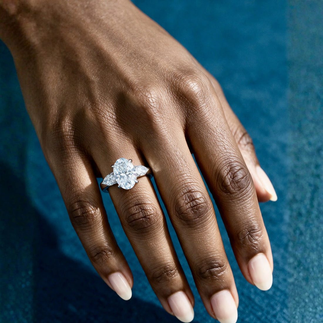 1.5 Carat Oval Cut Solitaire in Three Stone Setting Moissanite Ring